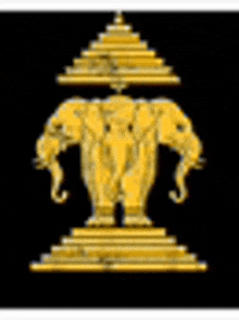 a statue of three elephants standing next to each other on top of a pyramid on a black background .