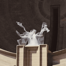 a statue of a woman in a white dress stands in front of a building with the letter l on it