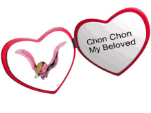 a heart shaped mirror with the words " chon chon my beloved " on it