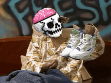 a person with a skull on their face holding a pair of sneakers