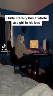 a dude literally has a whole ass girl in his bed sitting at a desk