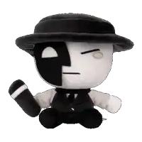 a black and white stuffed toy with a hat and a mask on his face