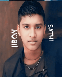 a close up of a young man 's face with the words jibon and sathi above him
