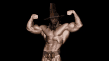 a very muscular man is flexing his muscles while wearing a hat and skull belt .