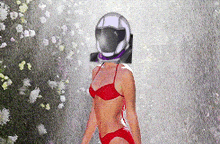 a woman in a red bikini is wearing a helmet on her head