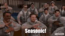 a group of people are wrapped in plastic bubble wrap and the word seasonic is on the bottom