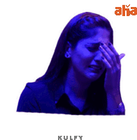 a woman is covering her face with her hand and the word kulfy is below her