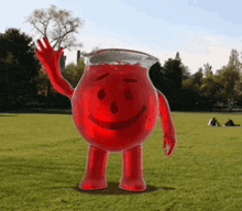 a red pitcher with arms and legs is standing in a field