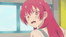 a close up of a girl with red hair making a surprised face