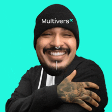 a man wearing a black beanie that says multivers