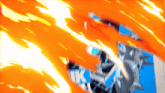 a blue and orange background with the letter k on the bottom right