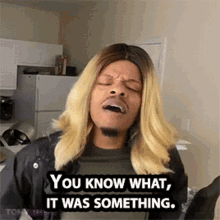 a man wearing a wig and a jacket says you know what it was something