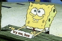 spongebob squarepants is sitting on a wooden bench holding a sign that says try me , hoe .