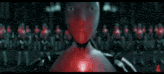 a blurred image of a robot with a red light coming out of its chest