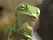 a cartoon lizard is smiling and looking at the camera while holding its hands to its chest .