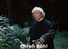 a man holding a bicycle with the words " chran buh " written on the bottom