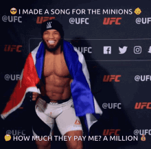 a man with a flag wrapped around his shoulders stands in front of a wall with ufc logos on it