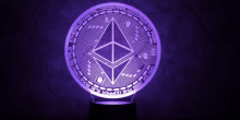 a purple coin with the word ethereum written around it