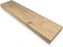a piece of wood with a hole in the middle