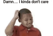 a boy in a red shirt is scratching his head with his hand .