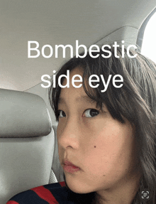 a girl in a car with the words bombestic side eye above her head