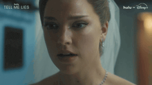 a close up of a woman with the words tell me lies on the bottom