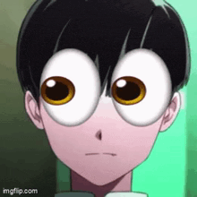 a close up of a person with big eyes .