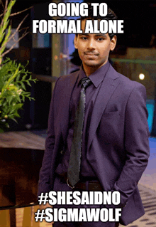 a man in a purple suit and tie with a caption that says " going to formal alone "