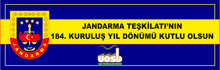 a blue and yellow banner that says jandarma teskilati 'nin