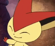 a close up of a cartoon character with a red hat .