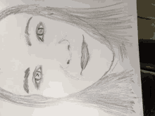 a pencil drawing of a woman 's face shows her eyes