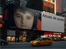 a billboard for abuso de poder with a picture of a boy