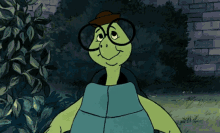 a cartoon turtle with glasses and a hat on