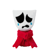 a stuffed animal with a sad face and a red scarf around it