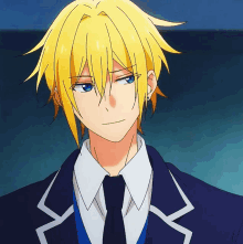 a man with yellow hair and blue eyes wearing a suit and tie