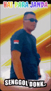 a man wearing sunglasses and a black shirt with the words hai para jada senggol donk