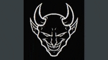 a white drawing of a devil 's head with horns and a smile on a black background .