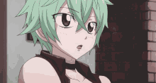 a close up of a girl with green hair