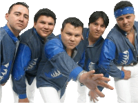 a group of men wearing blue shirts and white pants