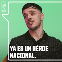 a man in a black shirt with a speech bubble that says ya es un heroe nacional