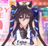 a girl with pigtails is holding a picture of a man with a beard and the words `` false '' .