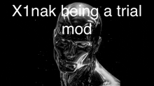 a statue of a man with the words `` x1nak being a trial mod '' on it .