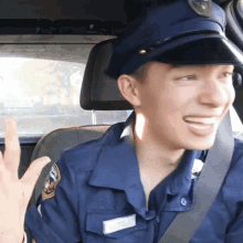 a man in a police uniform is smiling and wearing a name tag that says ' william ' on it