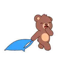 a teddy bear is holding a blue pillow in its paws