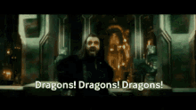 a movie scene with the words dragons ! dragons ! dragons ! written on it .