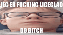 a young boy wearing glasses has a caption that says jeg er fucking ligeglad do bitch