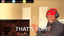 a man wearing headphones says that 's tuff in front of a video