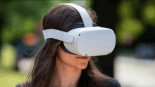 a woman wearing a virtual reality headset is looking at something