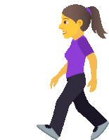 a woman in a purple shirt is walking