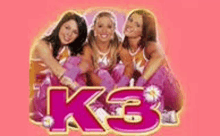 three girls are sitting next to each other on a pink background with the word k3 on it .